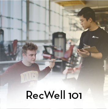 RecWell 101 text with image of personal trainer taking notes on client