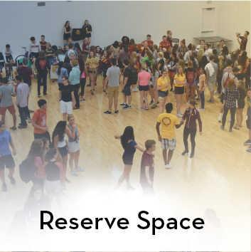 Reserve Space text with image of a crowd in a large room
