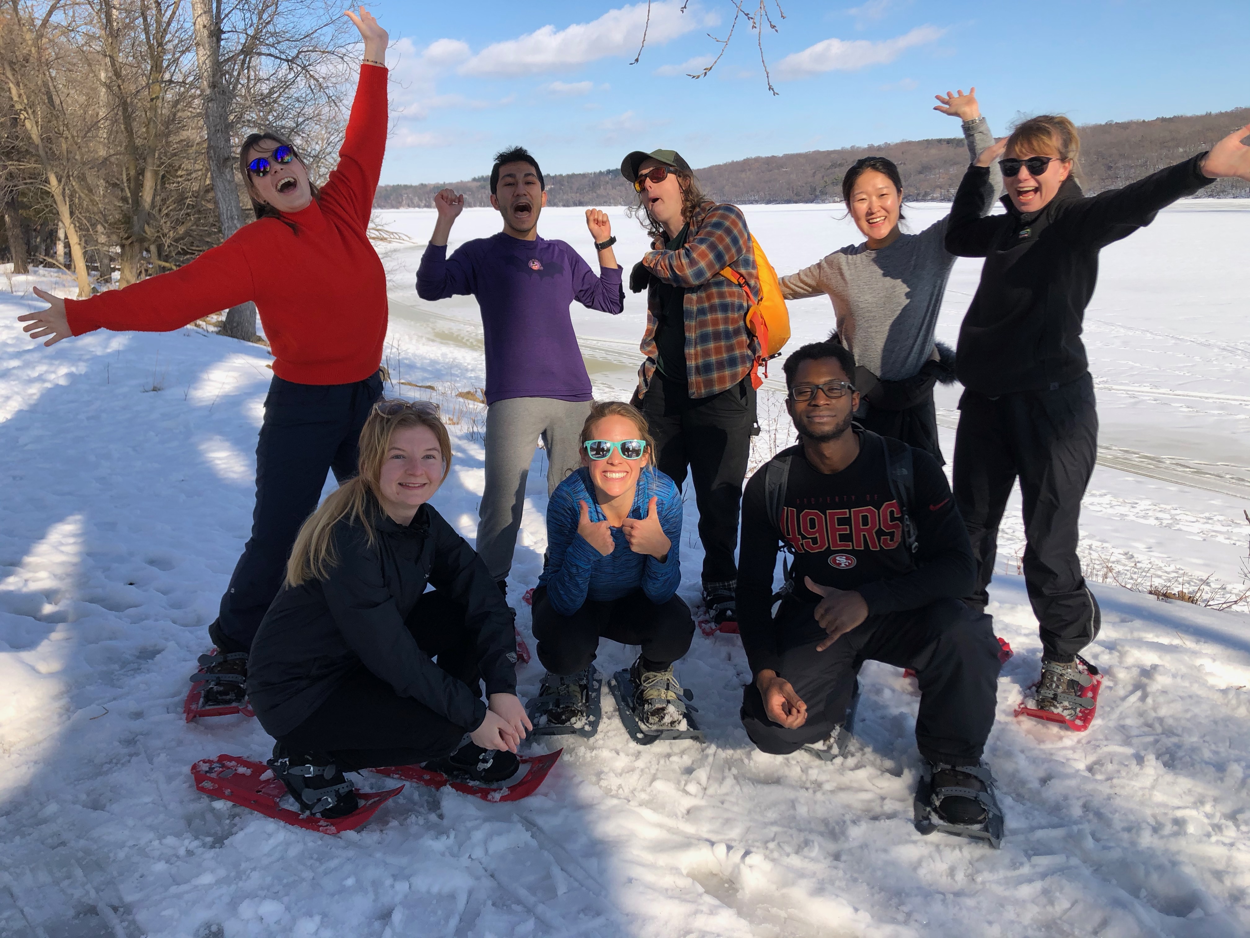 photo of a group of students posing after snowshoeing 