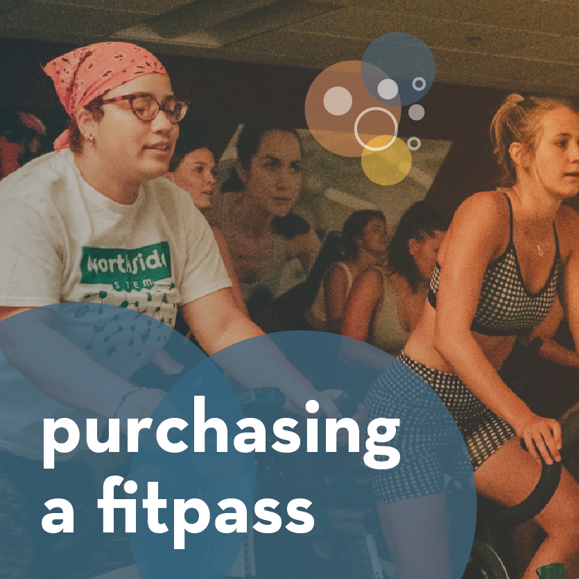 image of people in a cycle class with the text "purchasing a fitpass"