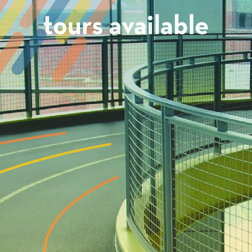 rounded corner of elevated track wit text "tours available"