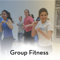 multiple students enjoying a high energy group fitness class